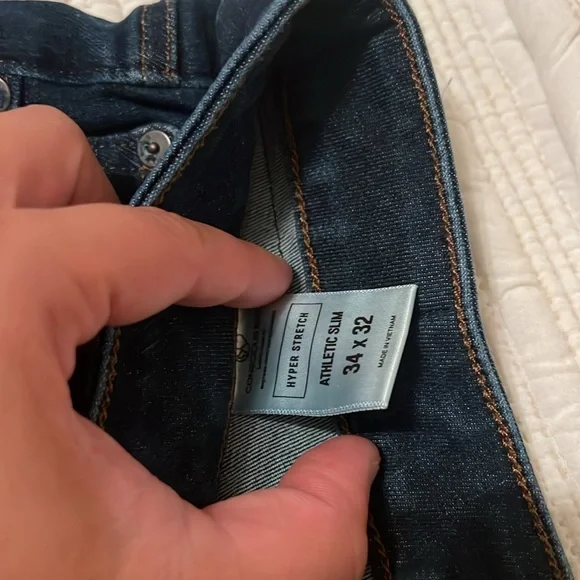 These are men express athletic slim 34x32 blue jeans only worn twice. - Picture 2 of 3
